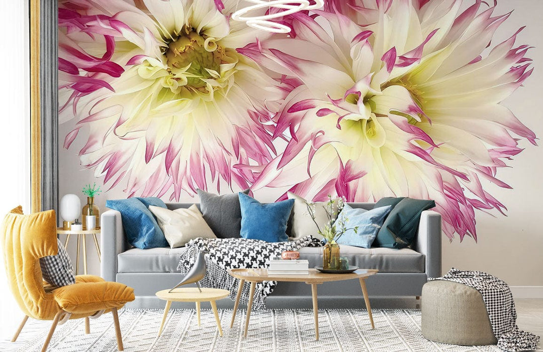 Grey sofa with cushions, vibrant Dahlia wallpaper, mustard chair, light wood coffee table, modern lounge.