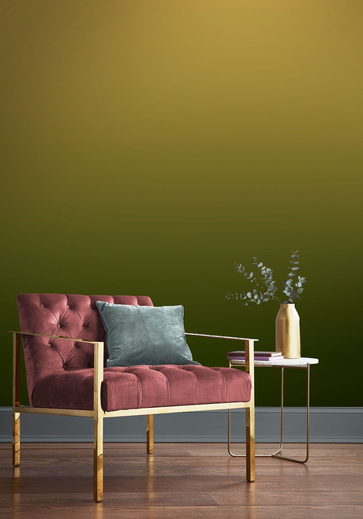 Golden Olive Ombre Gradient Wallpaper, velvet armchair, wooden flooring, modern minimalist decor.