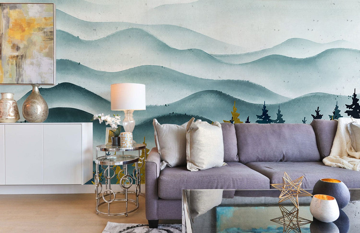 Tranquil Blue Forest Mural Wallpaper Design in living room with grey sofa, abstract art, and glass table.