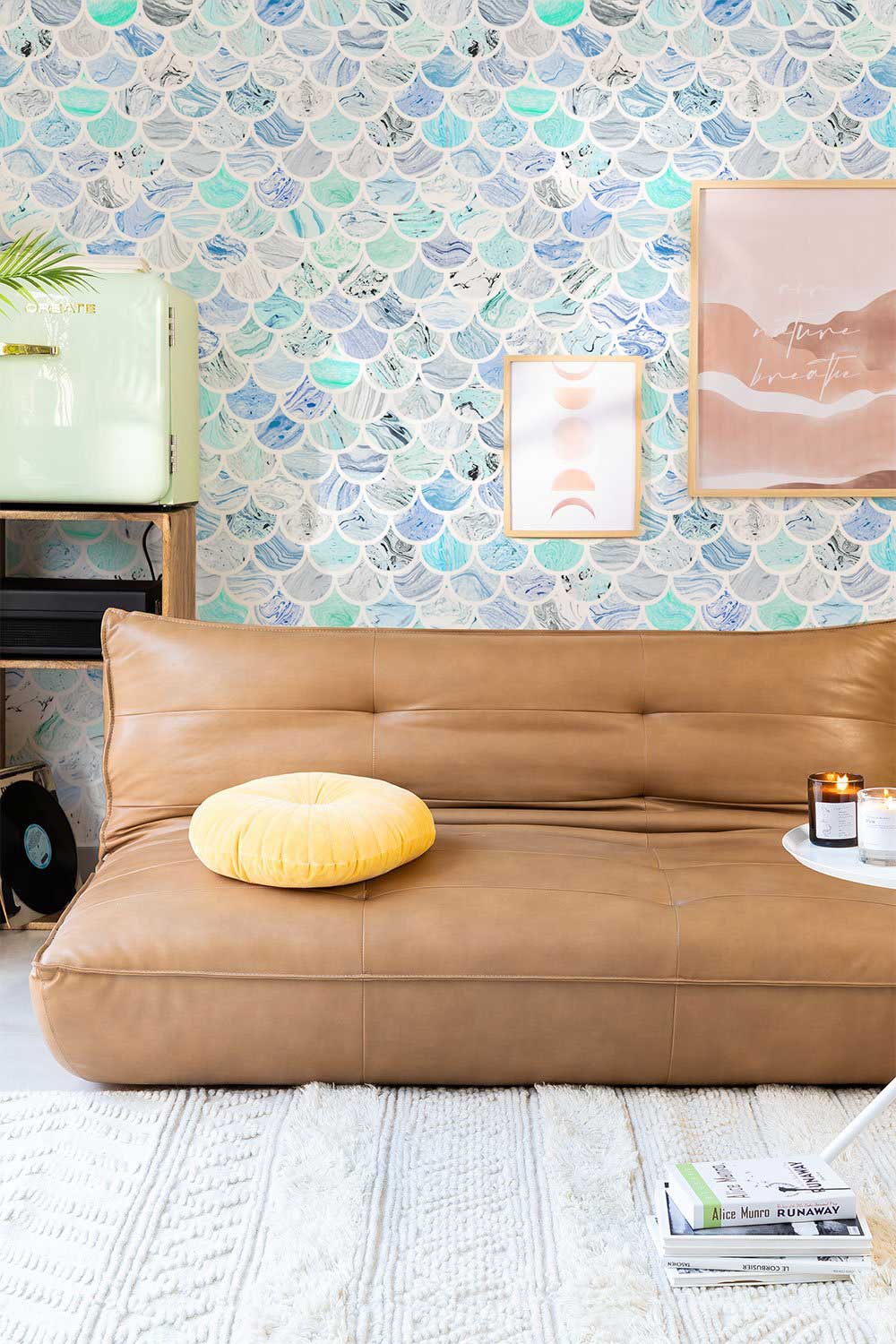 Aqua Blue Scallop Wallpaper, Coastal Design, Brown Leather Sofa, Lounge Room, Artwork Decor, Textured Rug.