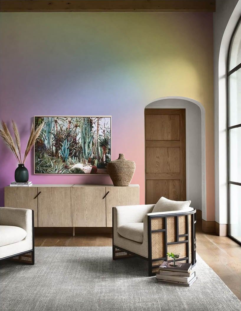 Pastel Dreamscape Gradient Mural Wallpaper in stylish living room with modern chairs and wooden flooring.