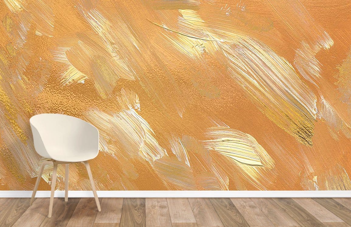 Golden Brushstroke Mural Wallpaper in earthy tones, featuring wooden flooring and a white chair.