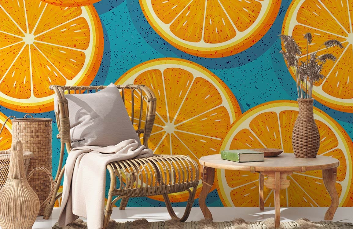 Tropical citrus wallpaper with orange slices design; wicker chair, neutral rug, vibrant blue accent wall.