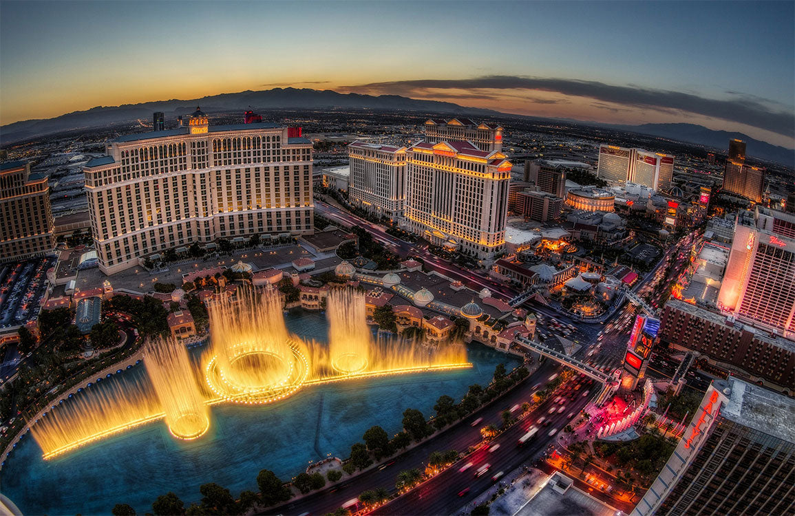Luxurious Las Vegas Skyline Evening Mural Wallpaper with Illuminated Fountains