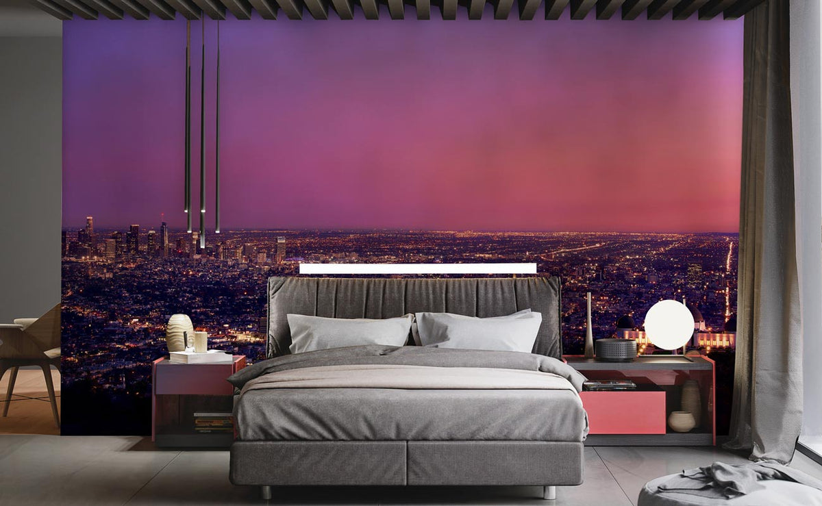 Vibrant cityscape twilight mural in bedroom; grey bed, modern pendant lights, urban elegance decor.