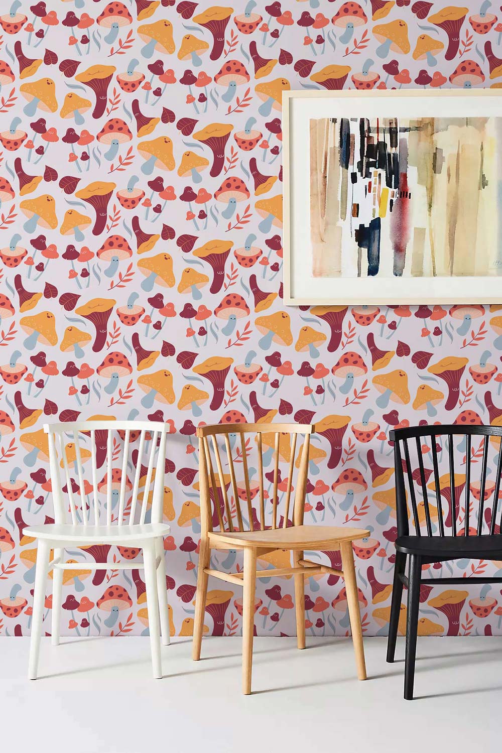 Autumn Forest Foxes Wallpaper with colourful abstract art, white floor, and three wooden chairs.