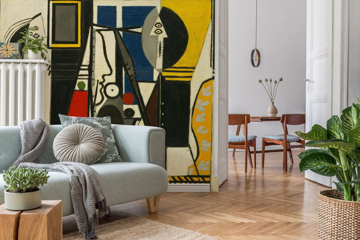 Abstract geometric mural wallpaper, colourful, modern style, behind light grey sofa, wooden flooring, stylish room.
