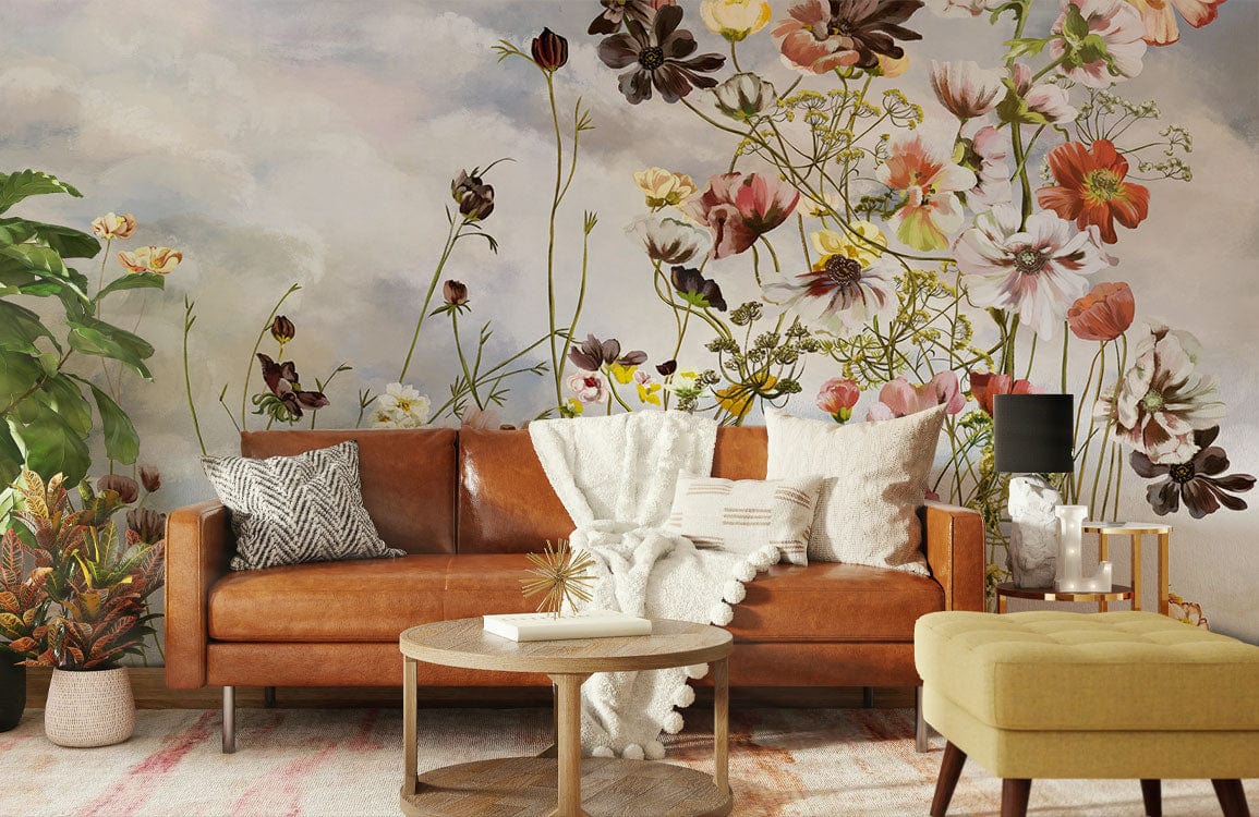 Vintage floral watercolour mural with pastel sky tones, brown leather sofa, modern living room setting.
