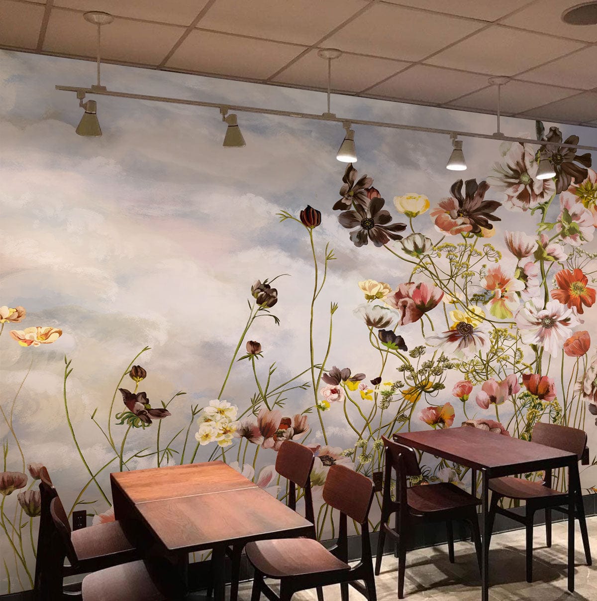 Vintage floral mural wallpaper with pastel tones, cafe setting, wooden tables, soft-toned ceiling lights.