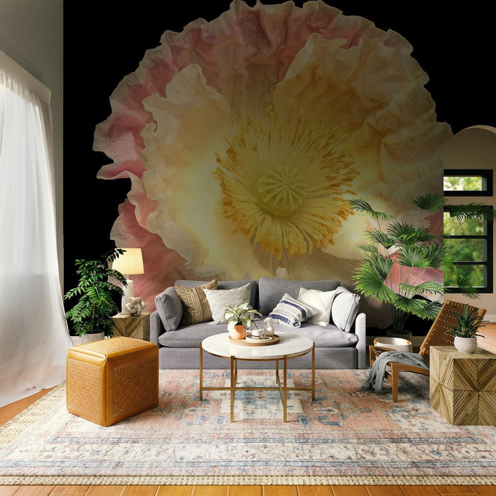 Elegant Pastel Pink Floral Bloom Mural Wallpaper in classic living room with grey sofa, modern accents, rug.