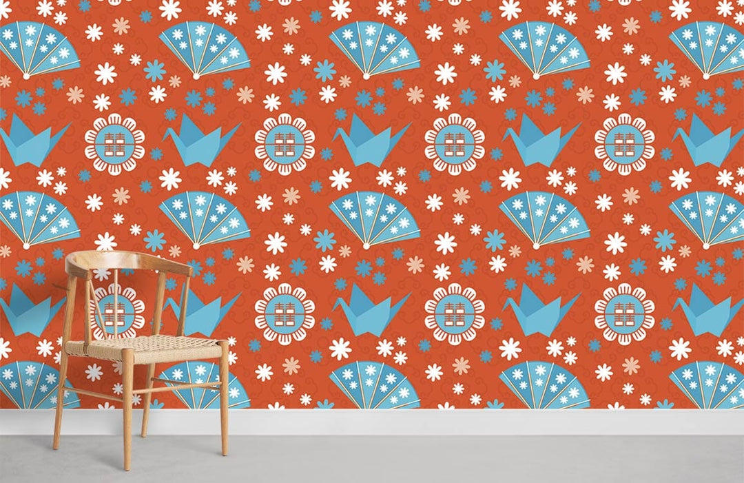 Vintage Japanese floral fan wallpaper in orange and blue, wooden chair, grey flooring, lively decor.