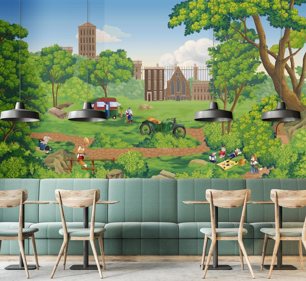 Vintage countryside picnic wallpaper mural, green sofa, wooden chairs, pendant lights, cafe setting.