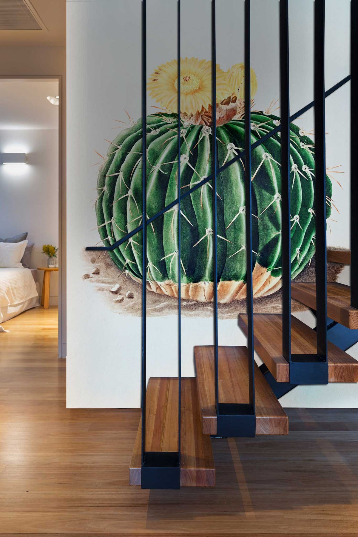 Botanical Succulent Cactus wallpaper; wooden staircase; laminate flooring; bedroom glimpse; modern interior design.