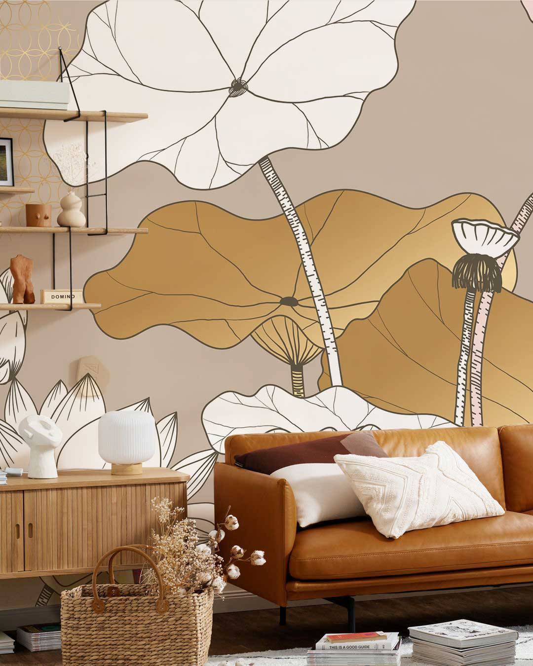 Elegant Gold and Beige Lotus Floral Mural Wallpaper with Brown Sofa, Wooden Cabinet, Beige Walls.