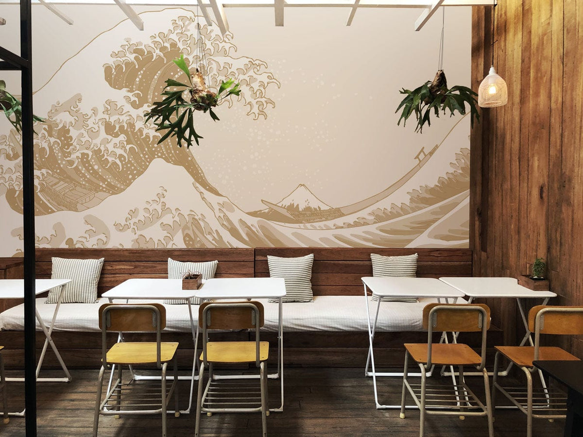 Beige Japanese Wave Mural Wallpaper in café with wooden walls, sleek tables, chairs, hanging lights.