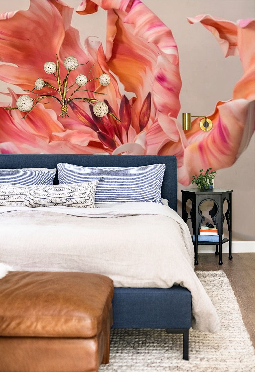 Blue bed, leather ottoman, tulip mural, grey wall, hardwood flooring, elegant bedroom interior design.