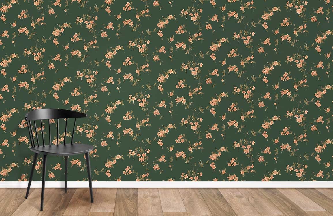 Vintage Floral Elegance wallpaper with green and peach botanical pattern, wood flooring, black chair.