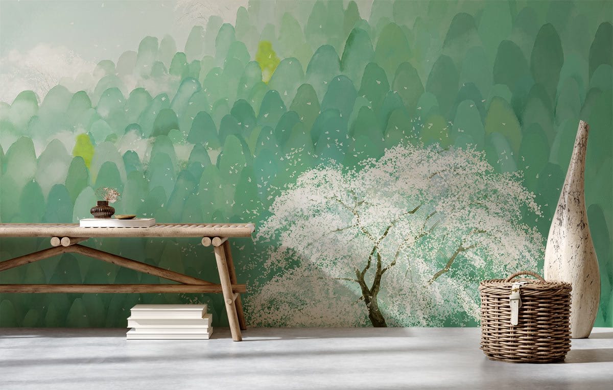 Serene Misty Green Forest Mural Wallpaper with Blossoming Tree, wooden bench, grey concrete floor, wicker basket.