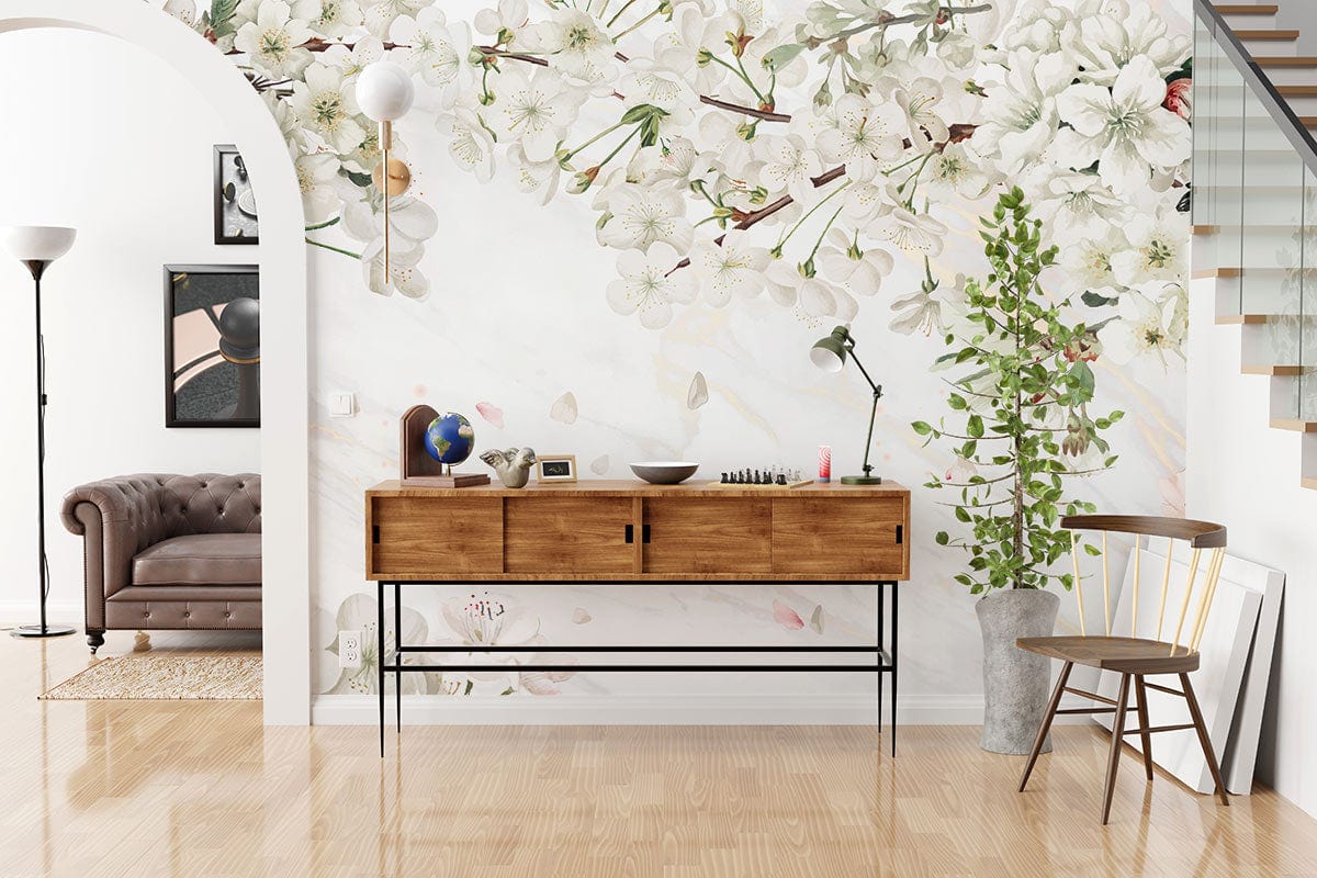 Elegant Blossom Haven Wallpaper in living room with tufted brown sofa and wooden sideboard.