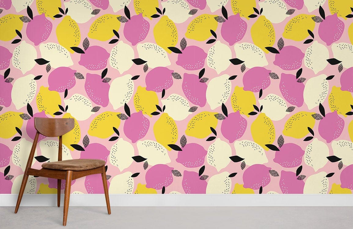 Vibrant Citrus Delight wallpaper: pink-yellow lemon design in modern room featuring wooden chair, grey flooring.