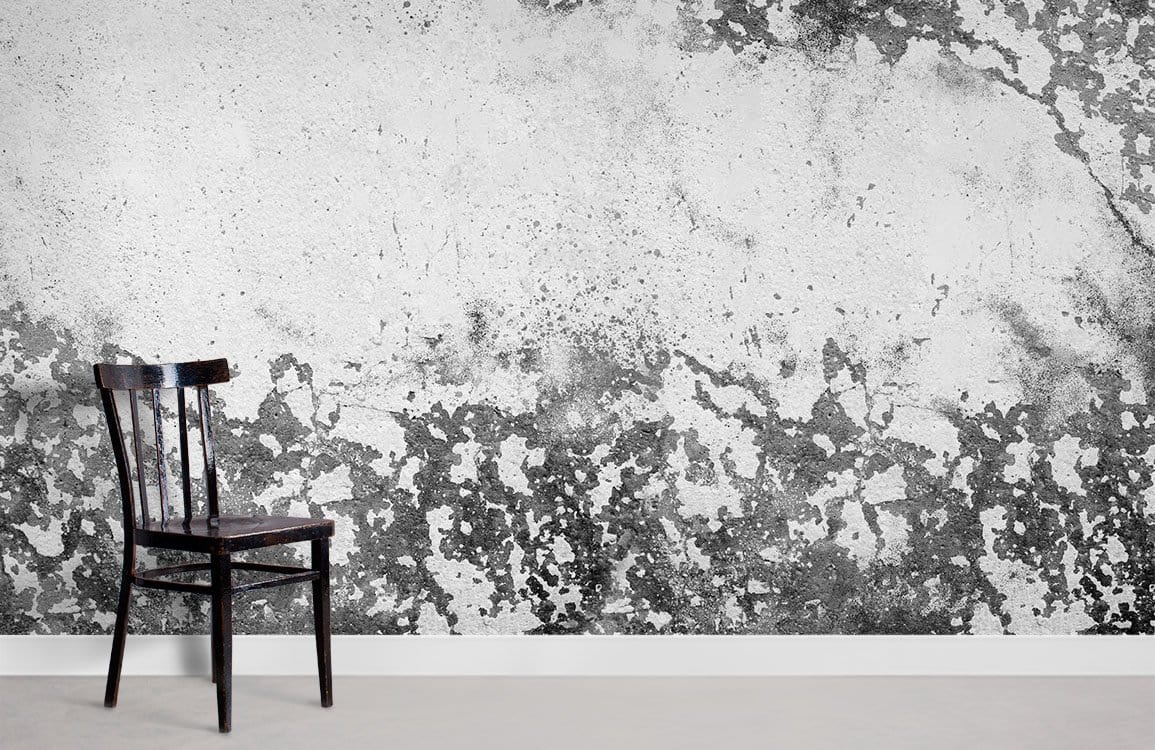 Antique Grey Distressed Wallpaper in modern interior with simple dark chair and light flooring.