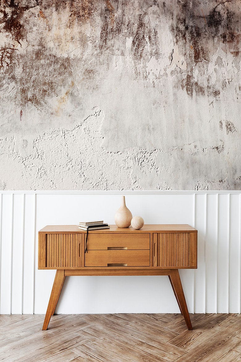 Rustic Industrial Aged Plaster Wall Mural, textured effect, with wooden cabinet and herringbone flooring.