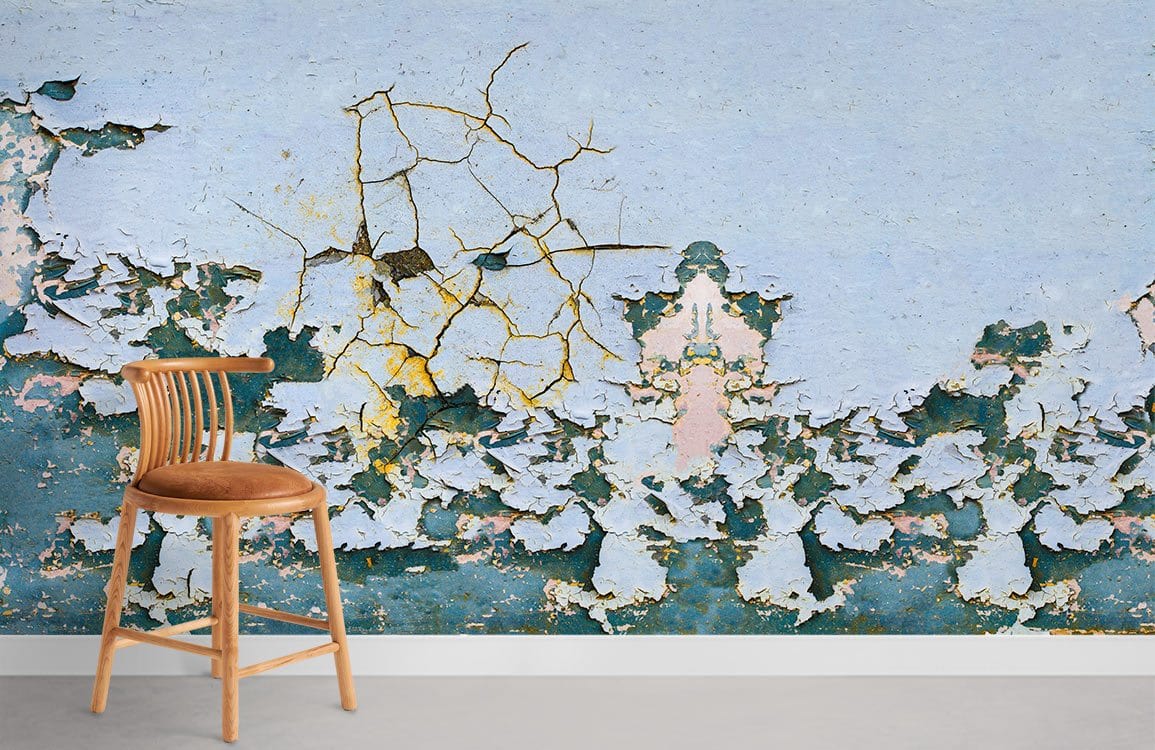Vintage Patina Textured Wallpaper with distressed blue, teal design in room with wooden chair, grey flooring.