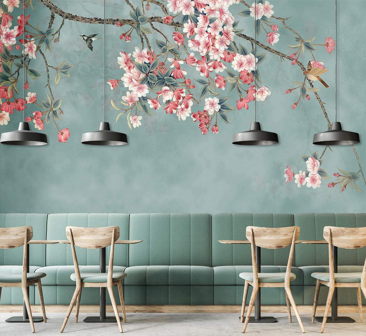Blossoming Cherry Tree Mural Wallpaper in dining room, pastel blue and pink, green sofa, pendant lights.
