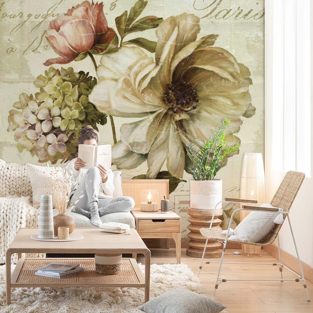 Vintage botanical mural wallpaper in soft pastels, elegant living room, cosy beige sofa, stylish decor.
