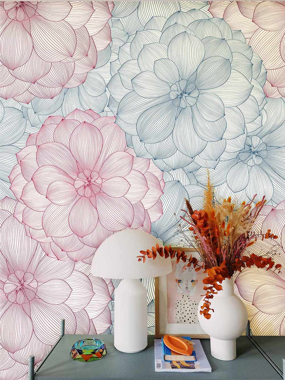 Pastel Floral Elegance Wallpaper in pink and blue with delicate blooms, featuring elegant decor accents.