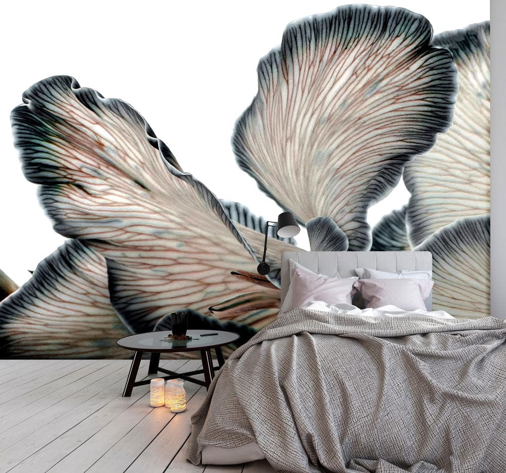 Abstract Monochrome Foliage Wallpaper in stylish bedroom, featuring grey sofa and wooden flooring.