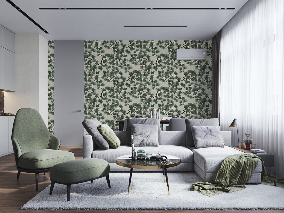 Vintage green botanical wallpaper in modern living room with grey sectional sofa, green armchair, wood flooring.