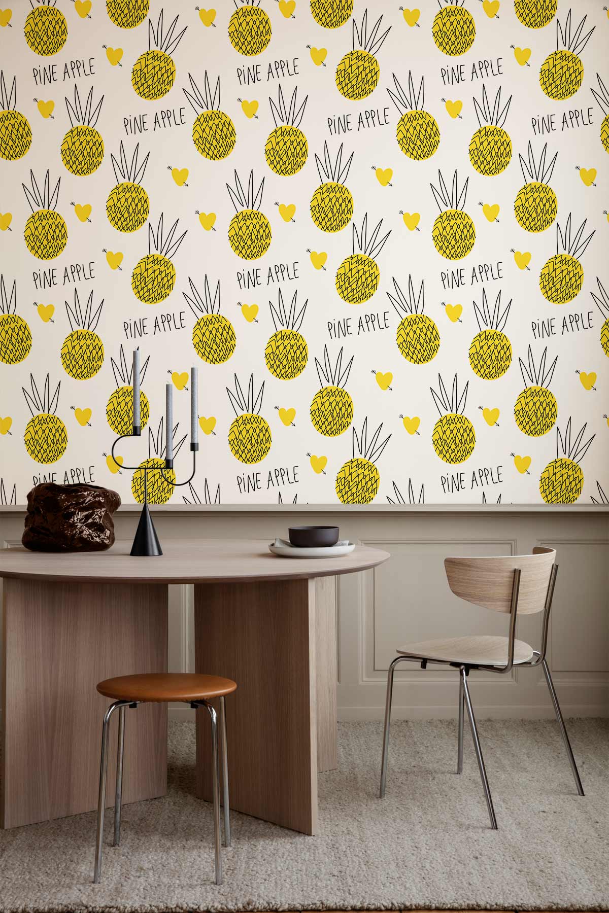 Tropical pineapple wallpaper in modern dining room with wooden table, chairs, and beige carpet flooring.