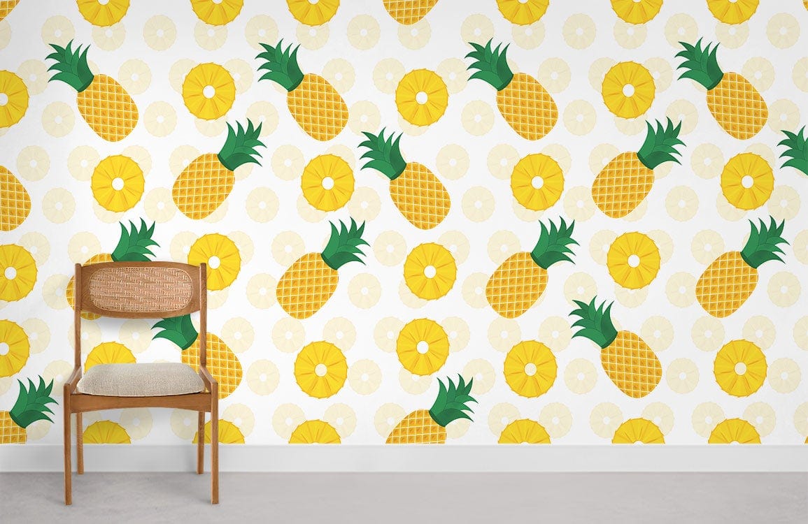 Tropical pineapple wallpaper in vibrant yellow and green, featuring a wooden chair and grey flooring.