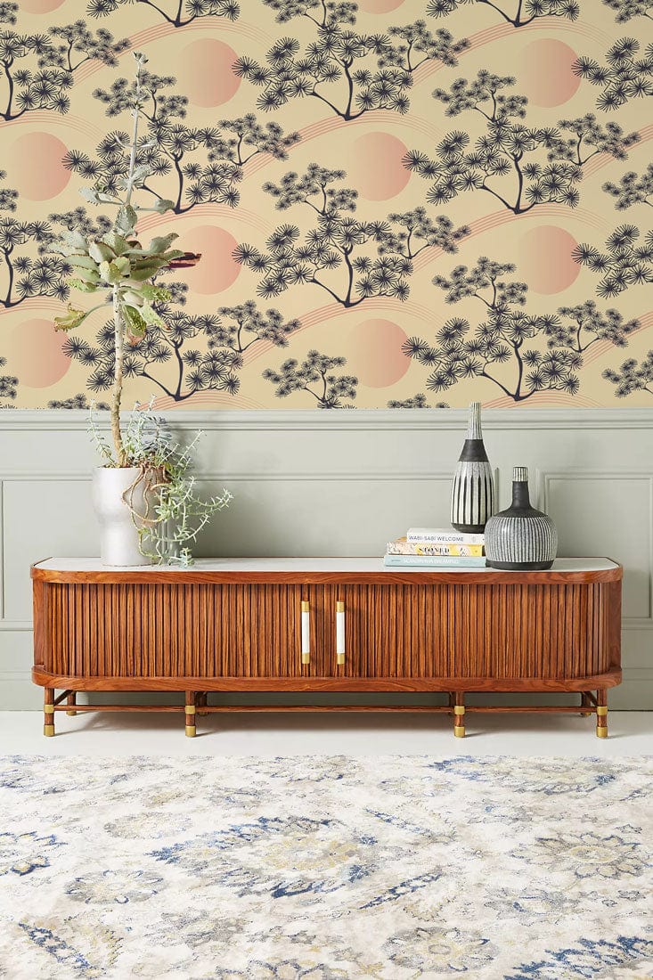 Vintage Oriental Sunset Wallpaper in a living room with wooden sideboard and patterned rug.