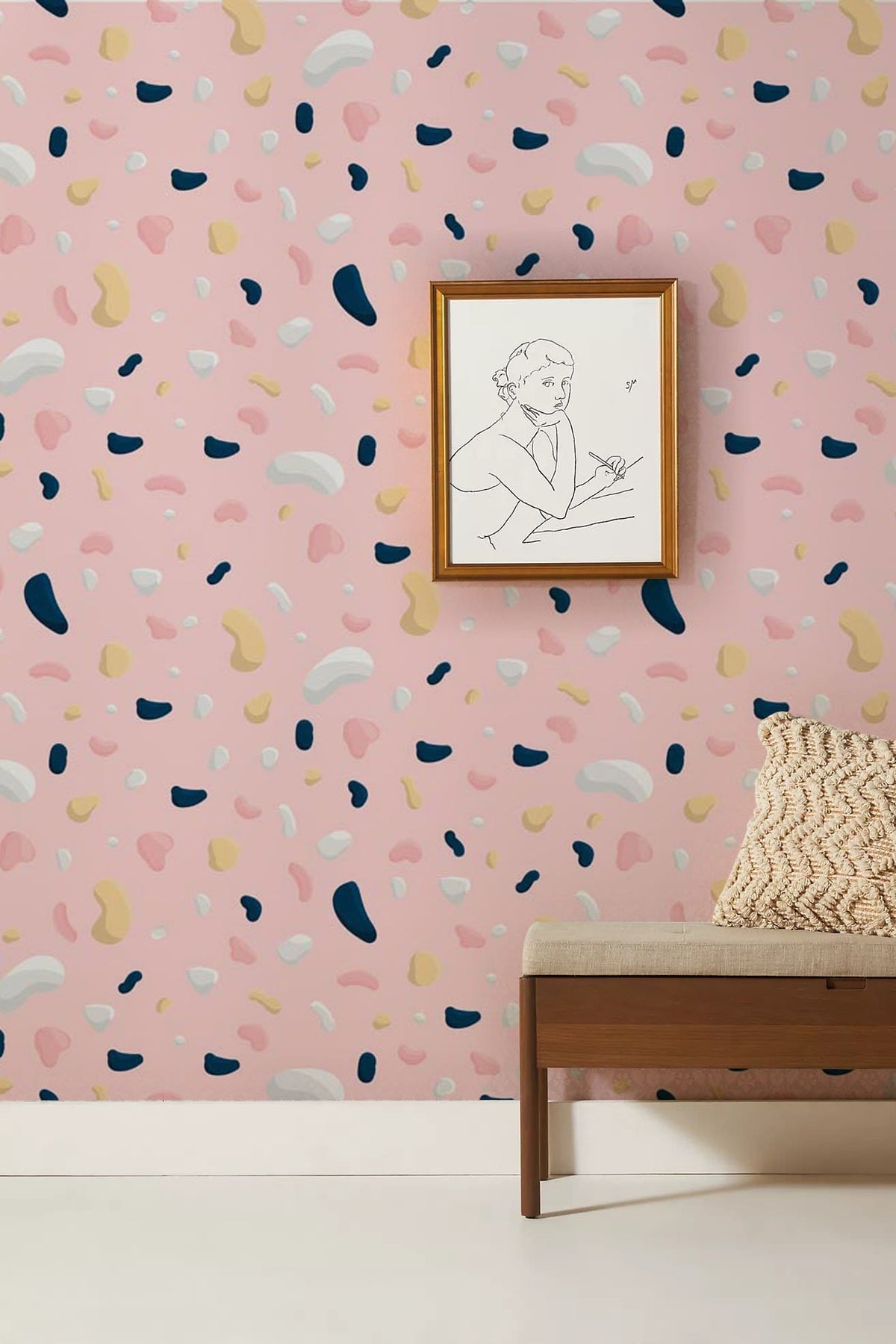 Playful Pink Pastel Confetti Wallpaper in modern room with beige bench, stylish decor, framed artwork.