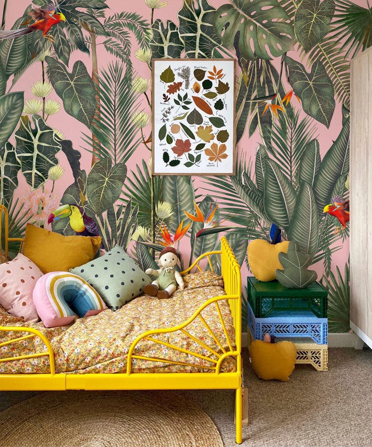Tropical Paradise Botanical Wallpaper; pink background, exotic foliage, yellow metal bed, child's room decor.