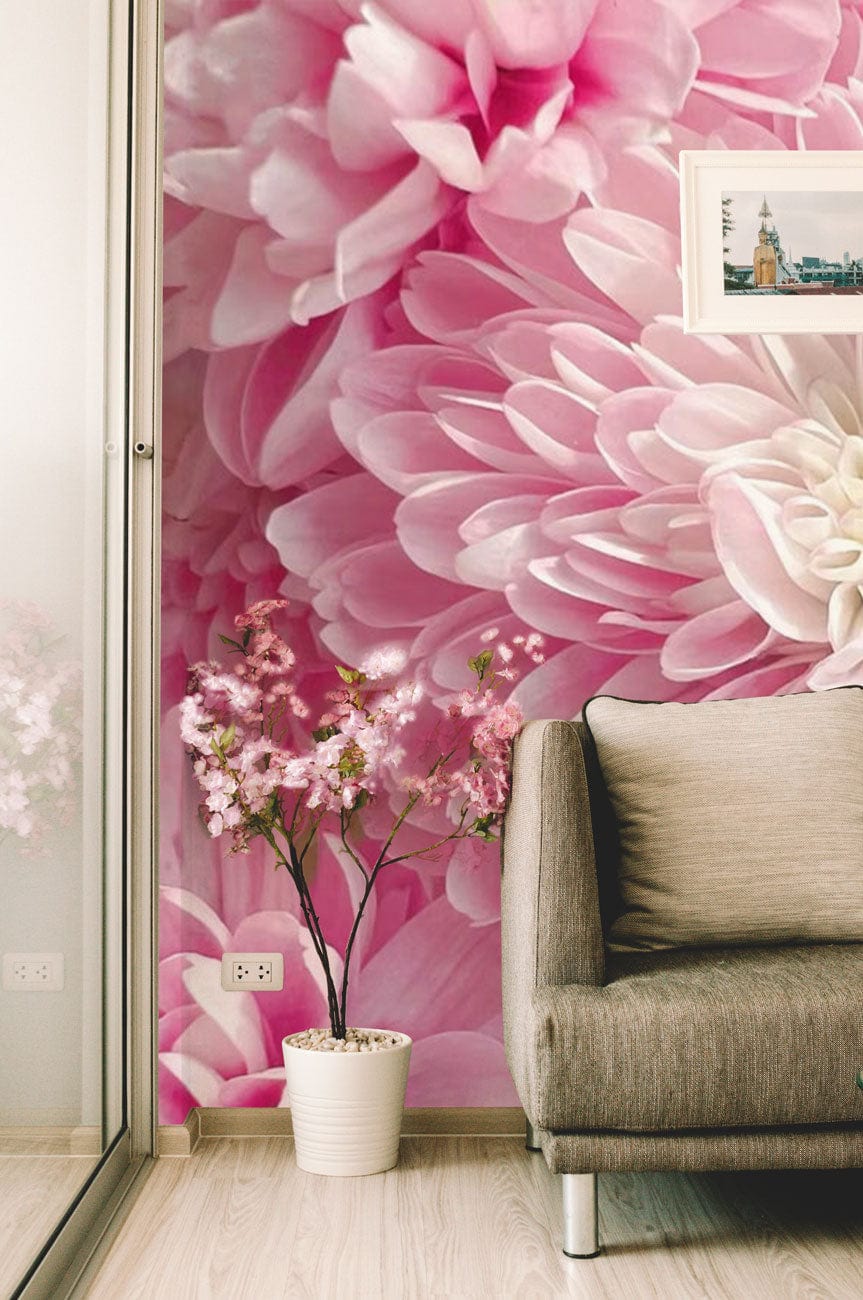 Blush pink chrysanthemum wallpaper in living room with beige sofa, mirrored closet, light wood flooring.