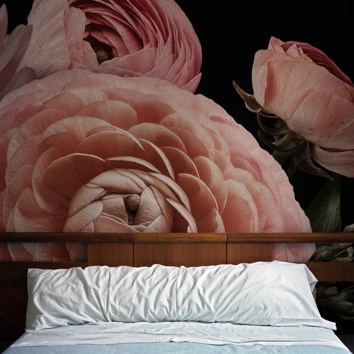 Elegant pink floral wallpaper in luxurious bedroom with wooden headboard, featuring soft, plush pillows.