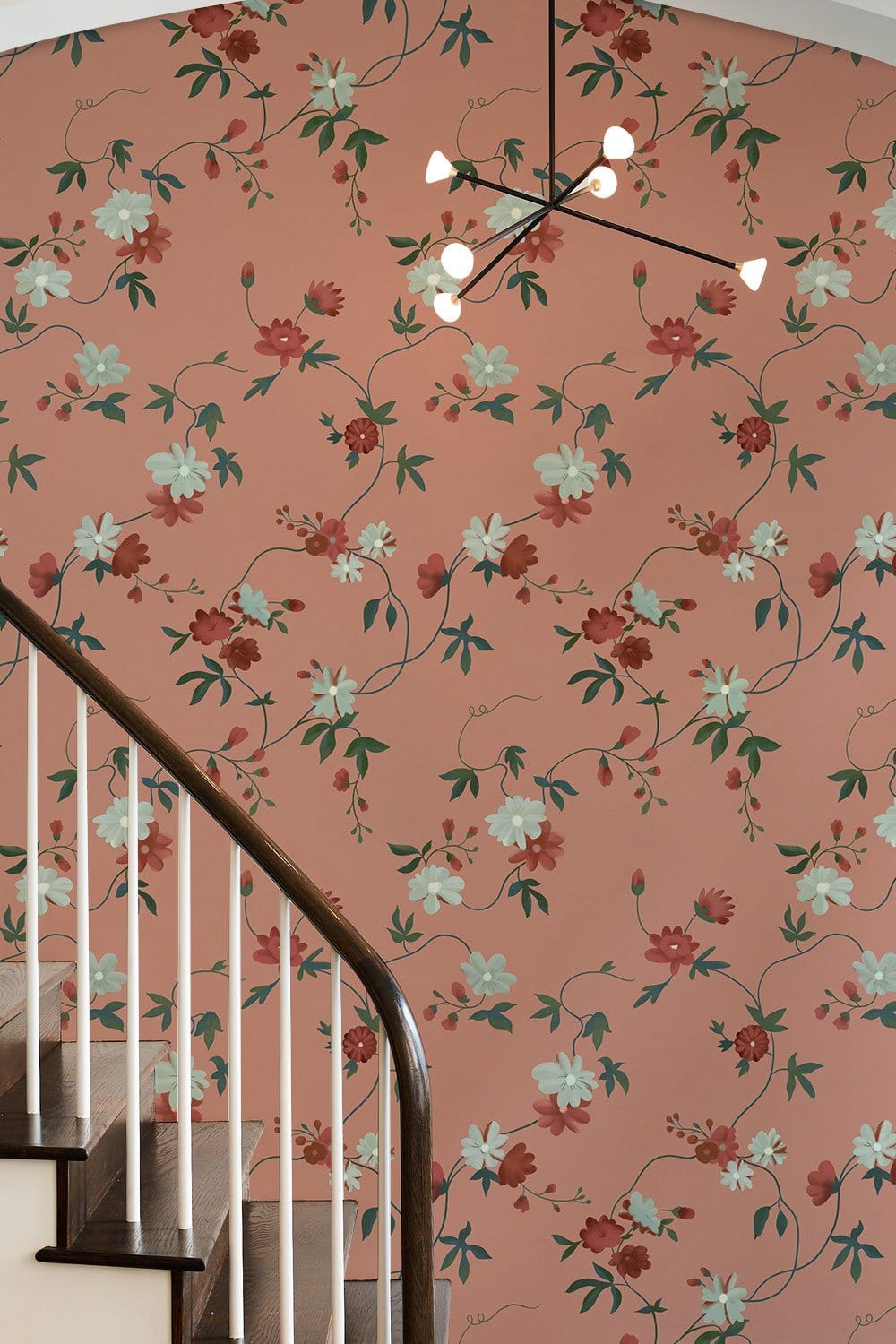 Vintage Floral Wallpaper in Coral Rose with Botanical Pattern, staircase, modern chandelier, elegant decor.