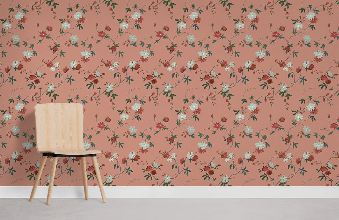 Vintage floral wallpaper in coral rose, delicate botanical pattern next to a light wooden chair.