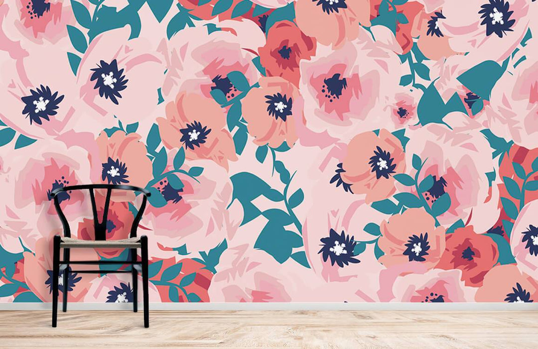 Vibrant floral wallpaper with pink-teal design, wooden flooring, black chair, enhancing modern room decor.