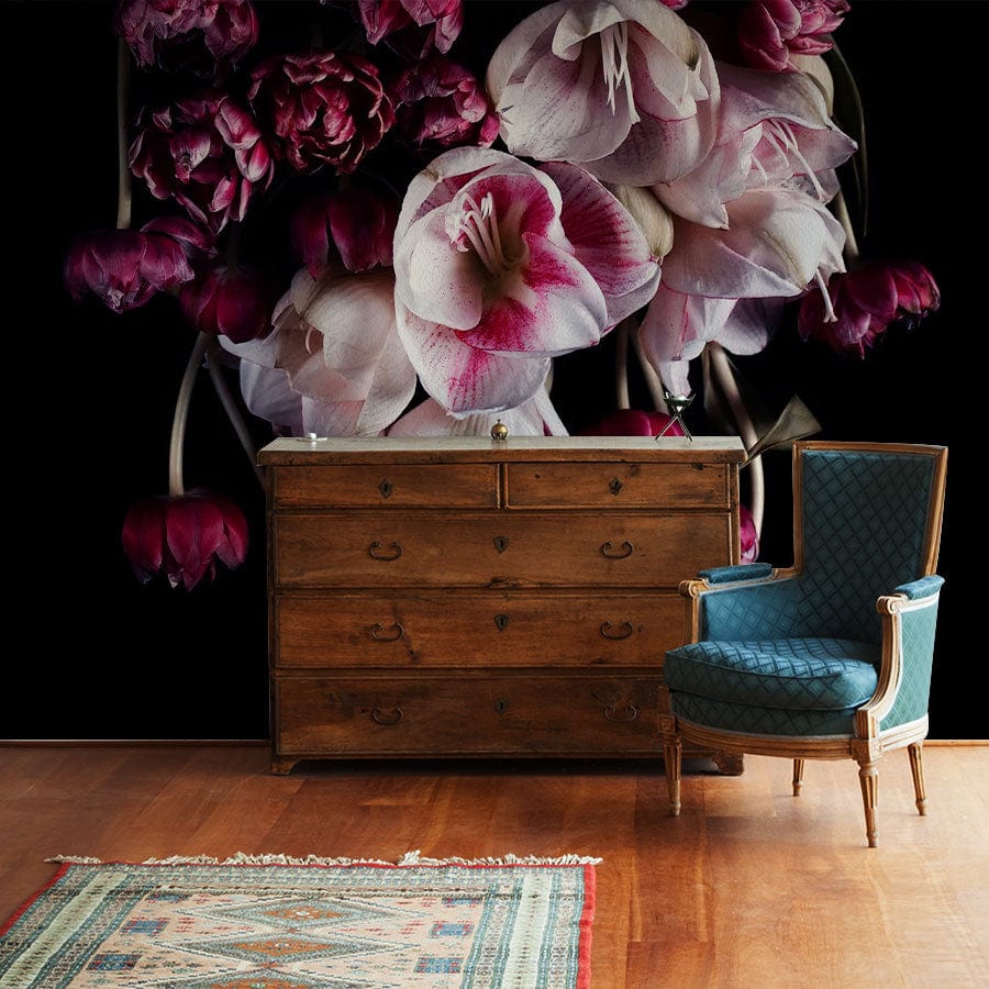 Luxurious dark floral wallpaper, dramatic red and white blooms, vintage chest of drawers, elegant armchair.