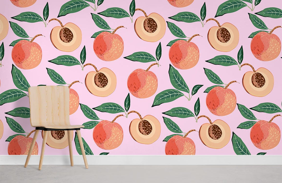 Vintage peach and green botanical wallpaper with pastel pink background, wooden chair, modern decor style.