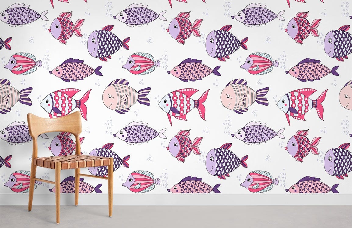 Whimsical oceanic fish pattern wallpaper, pastel tones, light chair, grey flooring, children's room decor.