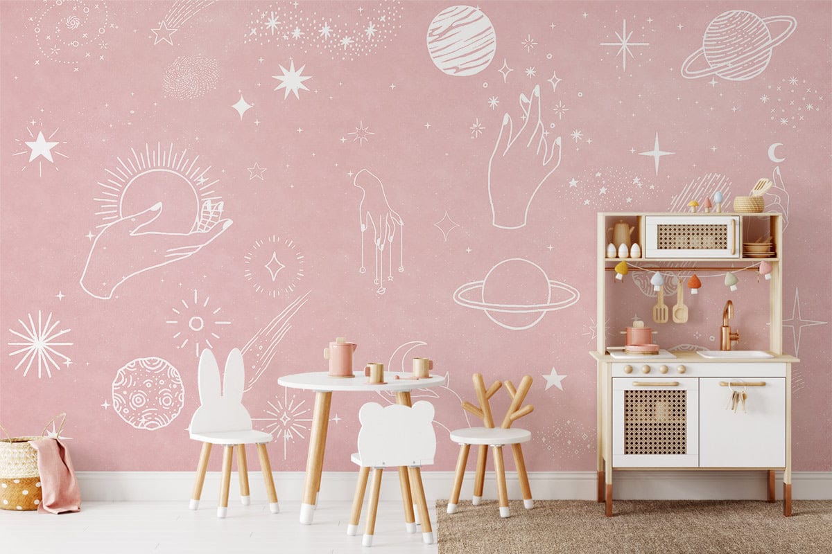Celestial Pink Cosmic Hand-Drawing Wallpaper in child's room with white furniture and playful decor.