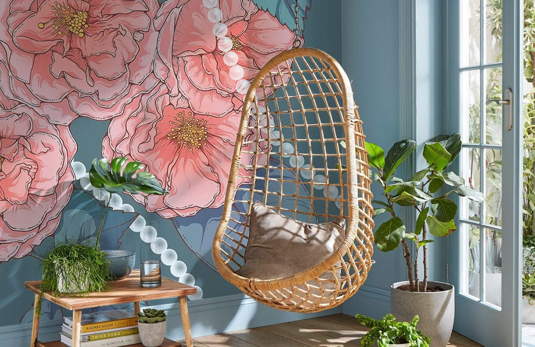 Elegant Vintage Floral Mural Wallpaper in living room with rattan swing chair and teal walls.