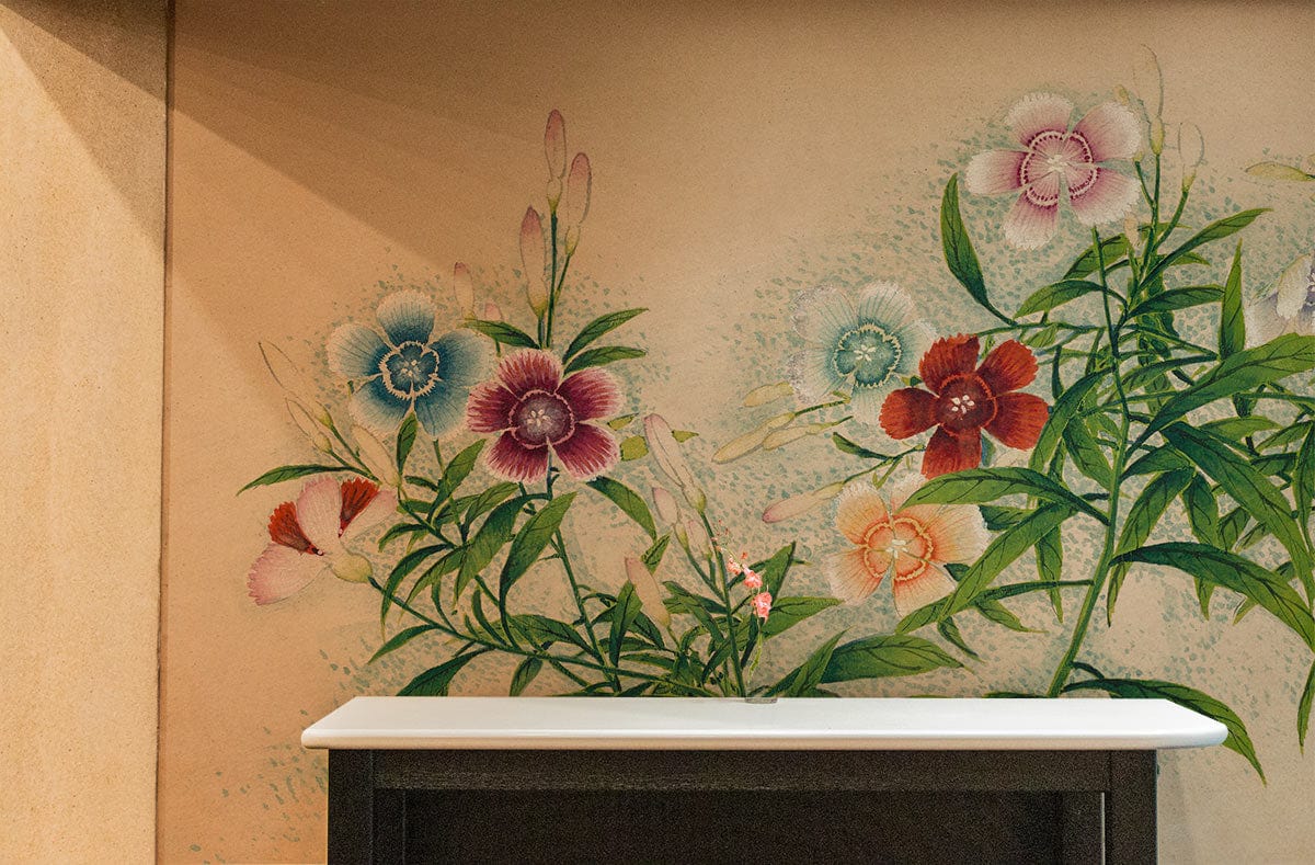 Vintage botanical floral wallpaper in pastels with green foliage, hallway setting, wooden table.