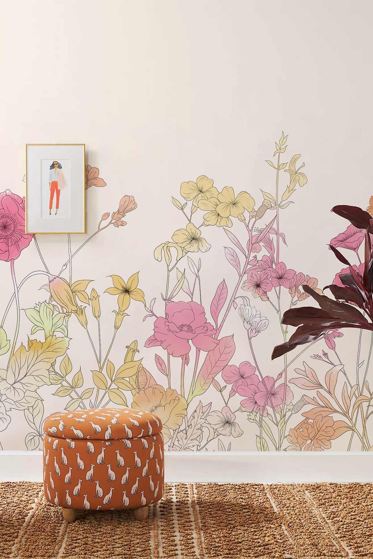 Pastel Floral Meadow Mural Wallpaper, elegant design, neutral wall, orange patterned pouffe, woven rug.