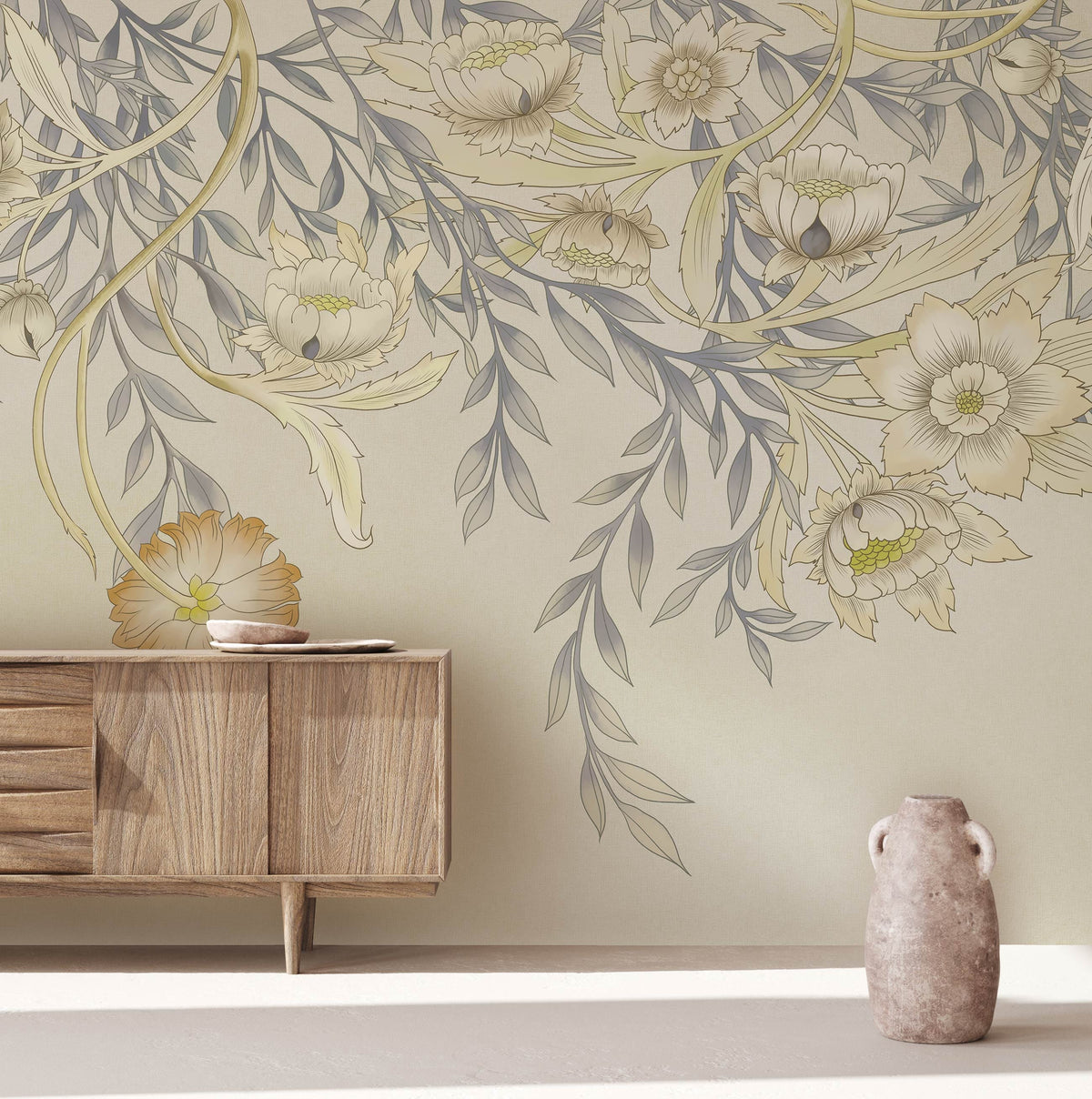 Vintage floral wallpaper in soft beige and green, mid-century sideboard, ceramic vase, living area.